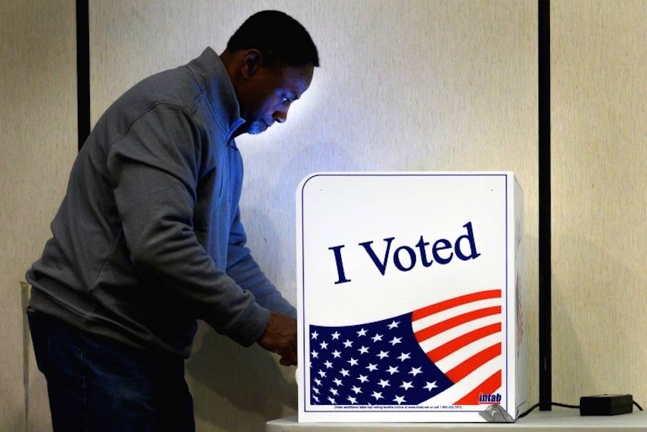 A man casts his vote at a polling station at South Carolina, the fourth US state to weigh in on the 2020 presidential election. — AFP