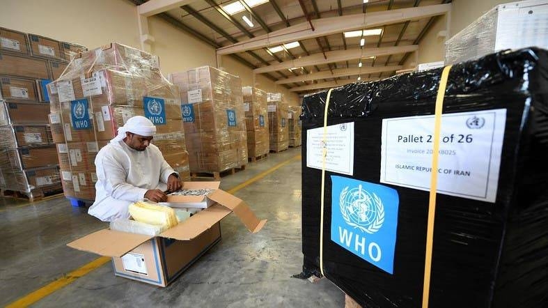 Officials check medical equipment and coronavirus testing kits provided by WHO at the Al-Maktoum International airport in Dubai, Monday. — Courtesy photo