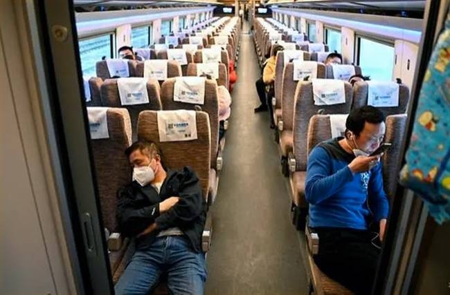 Only a handful of passengers dare disembark at Wuhan for what is essentially a one-way trip. — AFP