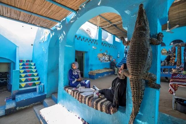 A mummified crocodile hangs at a house in the Nubian village of Gharb Soheil. — AFP 
