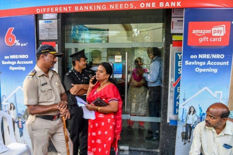 Indians fearing the collapse of Yes Bank flocked to ATMs and branches across the country on Friday and Saturday to withdraw cash. — AFP