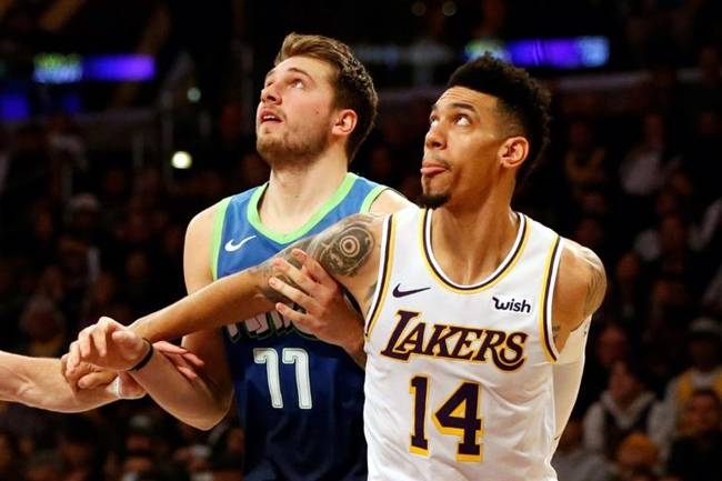 Dallas Mavericks Luka Doncic, shown here guarding a Lakers' player in a January NBA game, says opposing teams are taking liberties with him and the referees 
