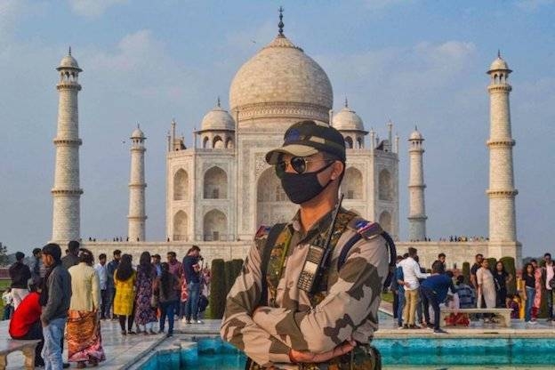 India on Wednesday suspended all tourist visas until April 15 and said it would quarantine travelers arriving from seven virus-hit countries in an attempt to contain the spread of the new coronavirus.