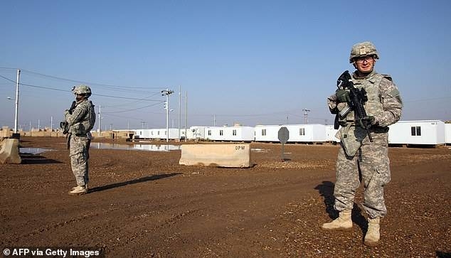 US soldiers walk around at the Taji base complex in Iraq, which hosts Iraqi and US troops, in this 2014 file picture. — Courtesy photo
