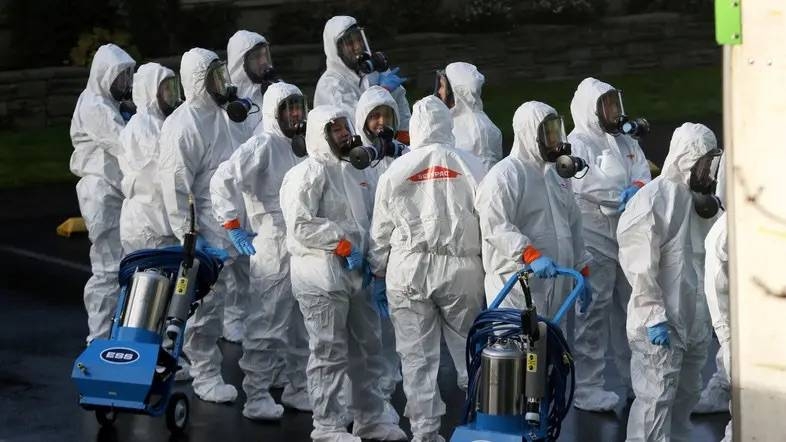 Cleanup crew prepared to enter Life Care Center of Kirkland, the Seattle-area nursing home at the epicenter of one of the biggest coronavirus outbreaks in the US. — Courtesy photo