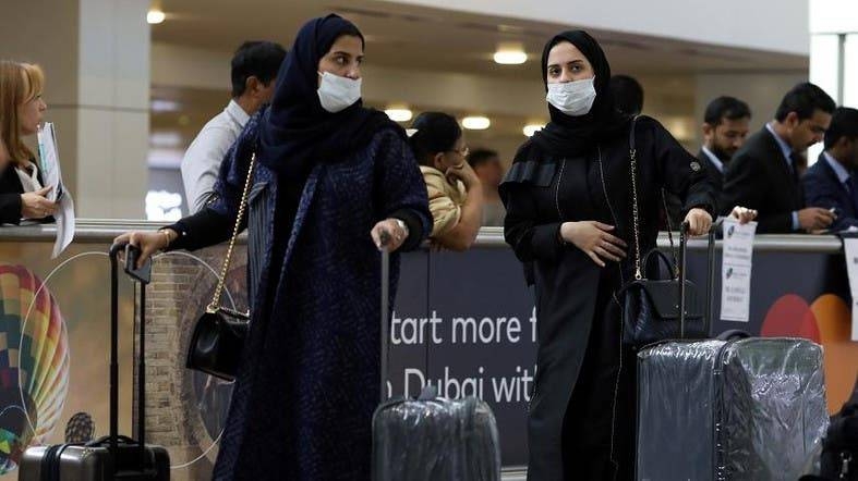 Travelers wear masks as they arrive at the Dubai International Airport in this Jan. 29, 2020 file picture. — Courtesy photo