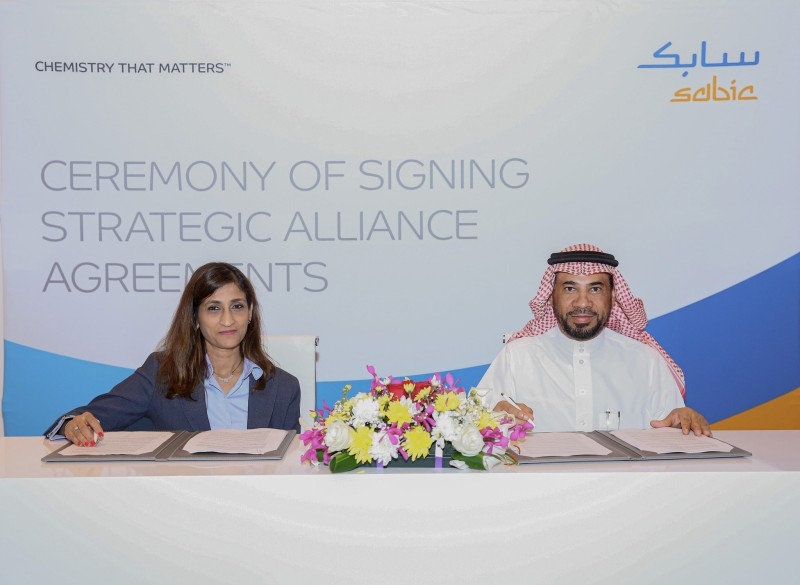 SABIC GPS general manager Abdullah Al-Garni, right, and Vidya Ramnath, president of Emerson’s Automation Solutions business in the Middle East and Africa, are seen during the signing ceremony — Courtesy photo