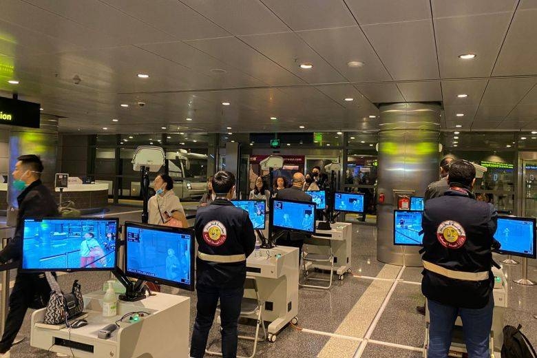 
Travelers walk past scanners upon their arrival at the Doha airport in this Jan. 24, 2020 file photo. — Courtesy photo
