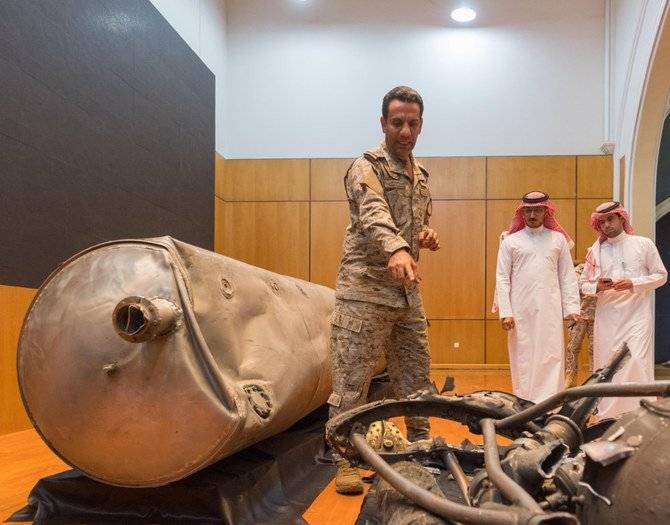 Col. Turki Al-Maliki, spokesman of the Saudi-led Arab coalition supporting Yemen's legitimate government, shows to the media on Sunday parts of the Houthi missile that was shot down over Riyadh the night before. -- SPA