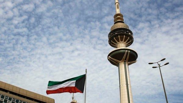 The Liberation Tower is seen near a Kuwaiti flag in Kuwait City. -- Courtesy photo
