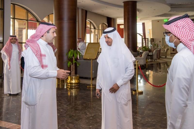 Minister of Tourism Ahmed Bin Aqeel Al-Khatib inspecting a hotel room set out for isolating returning citizens. 