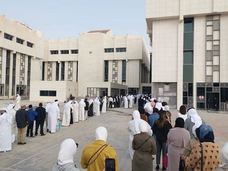 Kuwait government employees line up to get tested for coronavirus in this file picture. — Courtesy photo