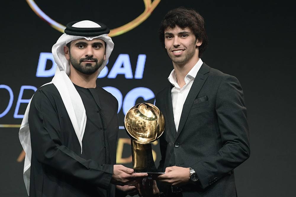 Sheikh Mansoor Bin Mohammad Bin Rashid Al Maktoum, the Chairman of Dubai Sports Council, presents Joao Felix with the Best Revelation Player trophy at the Dubai Globe Soccer Awards in December, 2019.
