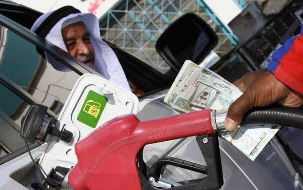A citizen fills up gasoline in this file picture. Saudi Aramco has announced a reduction in fuel prices in the Kingdom starting Saturday.