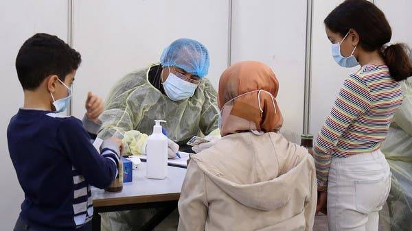 Expatriate returning from Egypt, Syria, and Lebanon arrive to be re-tested at a Kuwaiti health ministry containment and screening zone for COVID-19 coronavirus disease in Kuwait City. -- File photo