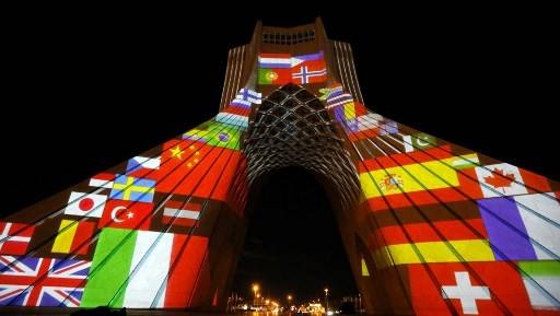 Iran's Azadi (Freedom) Tower is lit up with flags and messages of hope in solidarity with all the countries affected by the COVID-19 coronavirus pandemic, in Tehran on Tuesday. -- Courtesy photo