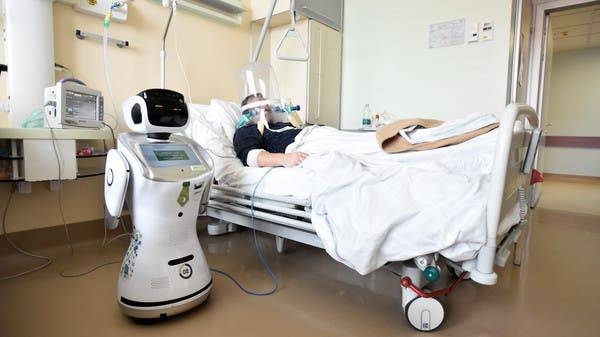 A robot helping medical teams treat patients suffering from the coronavirus disease (COVID-19) is pictured at a patient's room, in the Circolo Hospital, in Varese, Italy. -- Courtesy photo