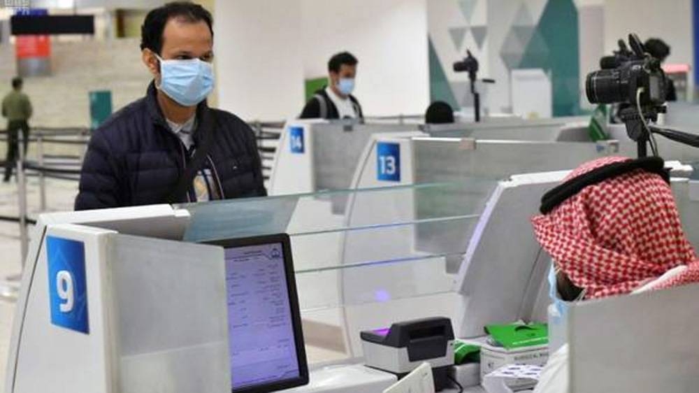 GACA has put in place precautionary measures for citizen arriving on repatriation flights. Citizen practice social distancing while undergoing passport procedures in Dammam.