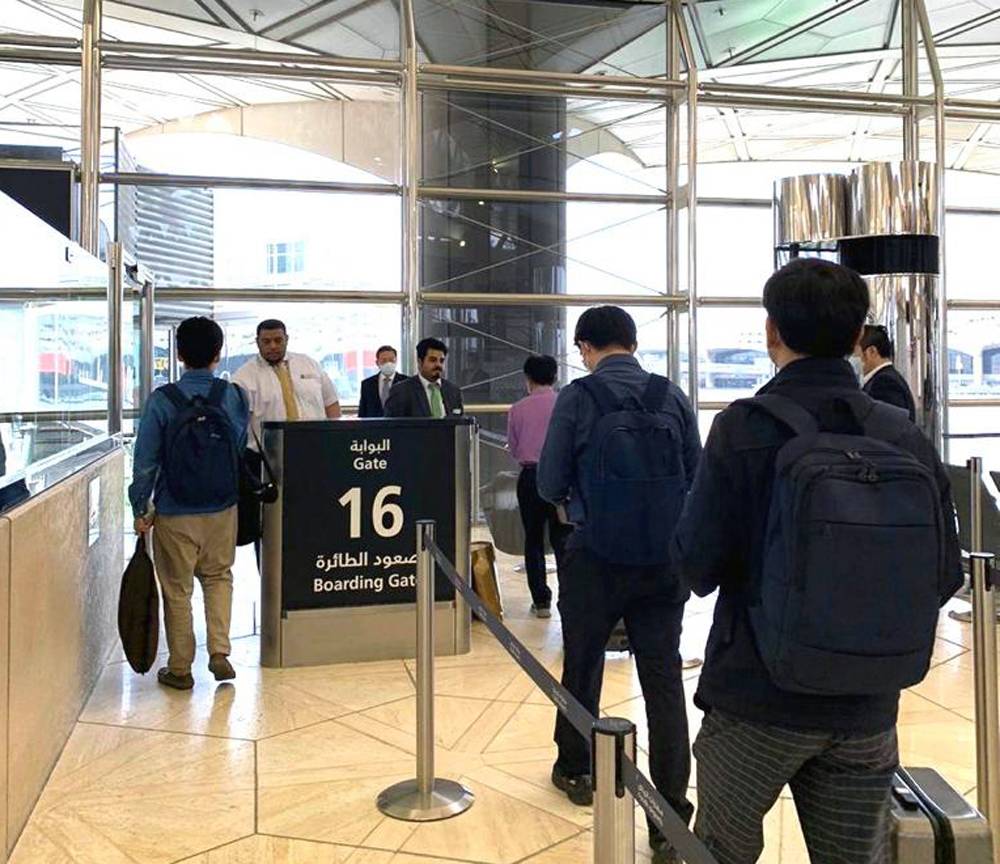 Koreans are screened before boarding the special Saudia flight to Korea.