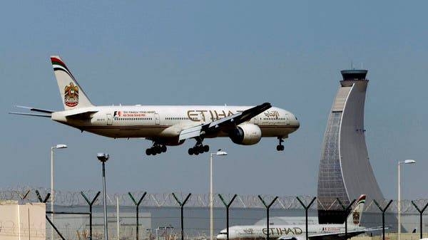 An Etihad Airways plane prepares to land at the Abu Dhabi airport. -- File photo
