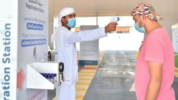 A medic tests people for coronavirus in the UAE. -- Courtesy WAM
