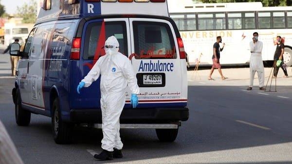 A first responder arrives to take a patient in the Al Quoz industrial district of Dubai. -- File photo
