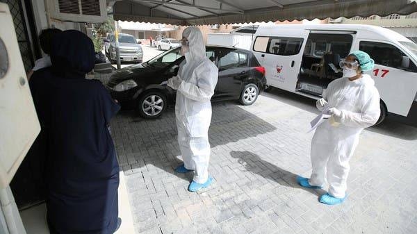 Doctors call a traveler who returned from Iran at their residency, to check if is infected with the novel coronavirus, at Isa Town Health Center, south of Manama. -- File photo