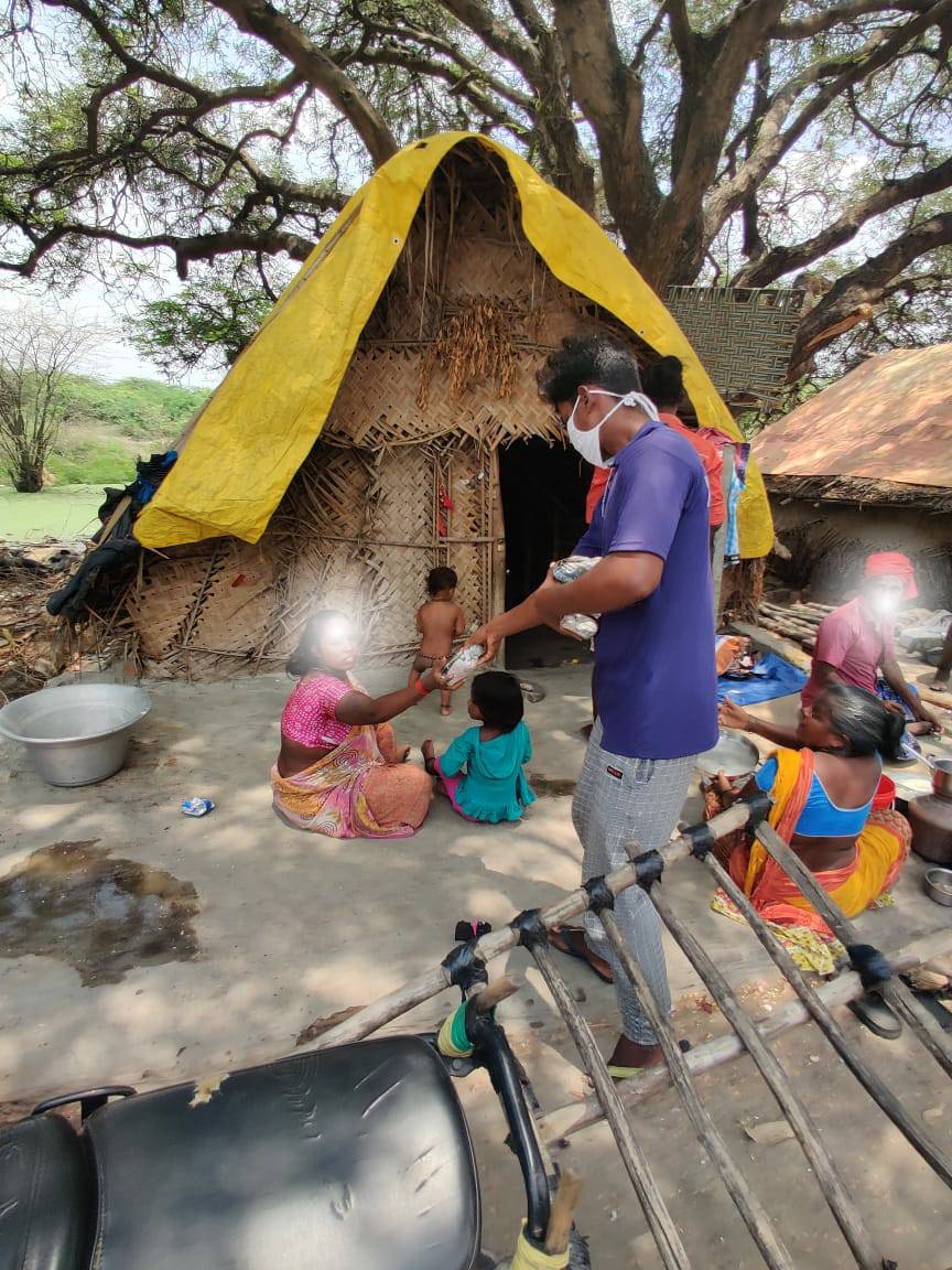 Tamil society members reach out to the poor back home