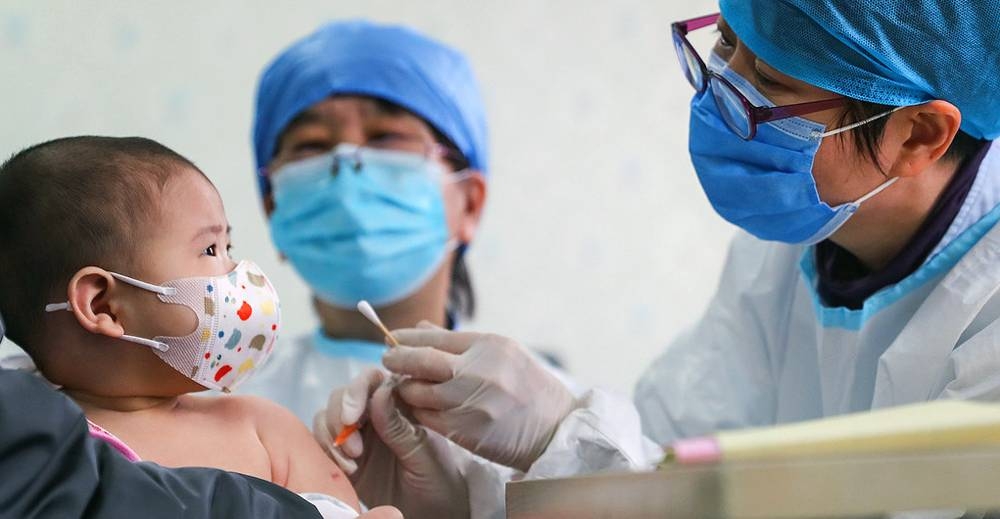 
A 6-month-old baby receives a delayed vaccine shot at a community health center in Beijing, China. — courtesy photo UNICEF