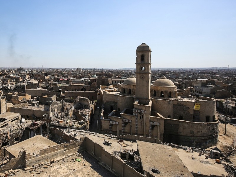 A view of destruction surrounding the Roman Catholic Church of Our Lady of the Hour in the old city of Mosul, eight months after it was retaken by Iraqi government forces from the control of Daesh.