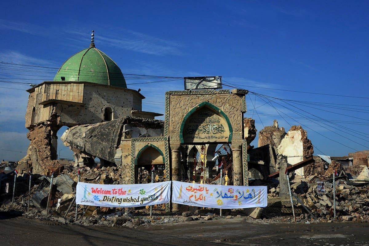 A view of destruction surrounding the Roman Catholic Church of Our Lady of the Hour in the old city of Mosul, eight months after it was retaken by Iraqi government forces from the control of Daesh.