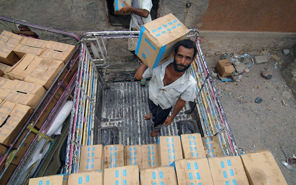 A family from Amran Governorate in Yemen shares lunch. — courtesy UNICEF