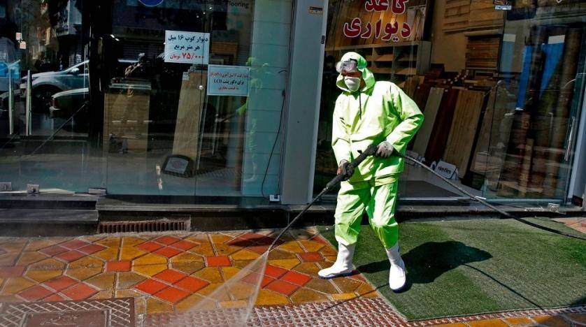 A municipality worker disinfects a street in the capital Tehran for COVID-19. -- Courtesy photo
