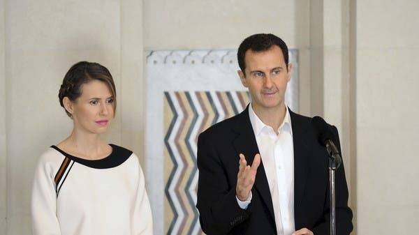 Bashar Al-Assad and his wife Asma. — File photo
