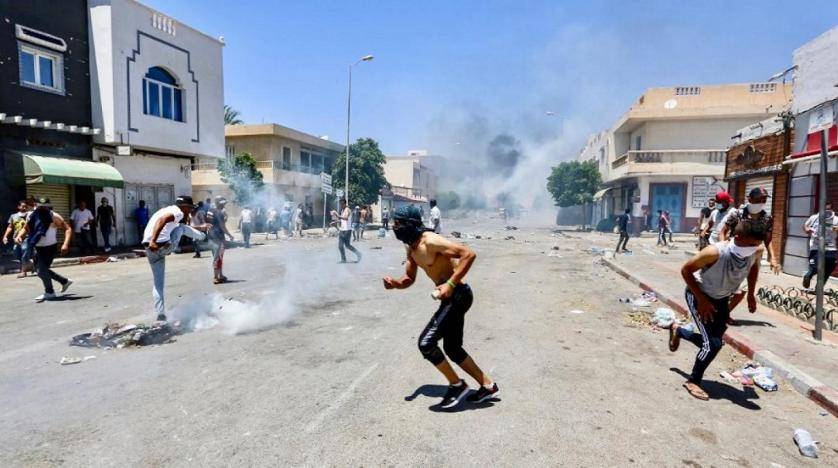 Protesters in Tunisia's Tataouine region clash with security forces firing tear gas during a demonstration in the southern city. — Courtesy photo
