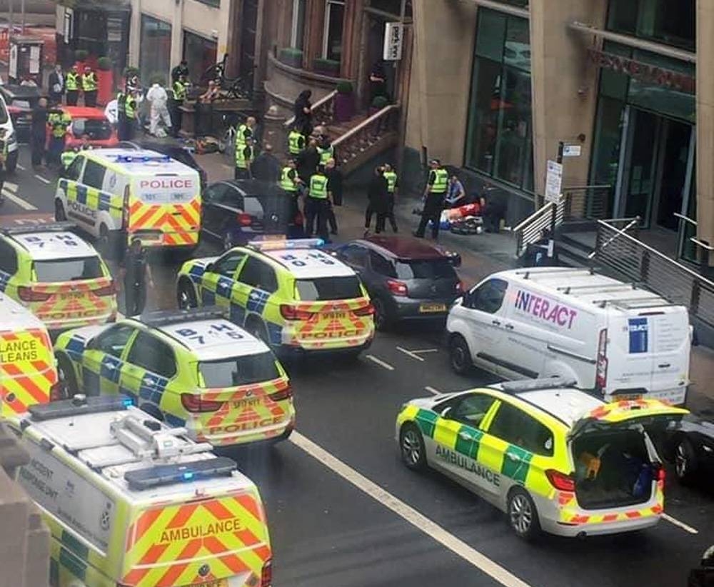 Scottish police cordon off a Glasgow city center area after three people were stabbed to death. — Photo courtesy Twitter