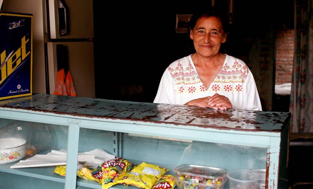 A seasonal worker at a store in Buga, Colombia. — courtesy World Bank/Charlotte Kesl