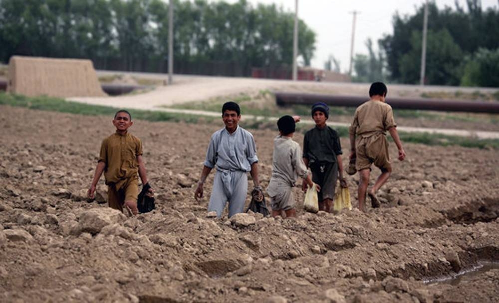 Child farmers help to level fields in Balkh Province, Afghanistan. — courtesy World Bank/Ghullam Abbas Farzami