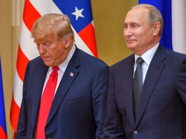 US President Donald Trump and Russian President Vladimir Putin are seen in this file picture. — Courtesy photo