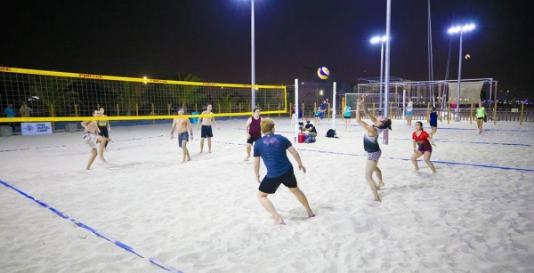 Action during the Esperia Beach Volleyball Tournamentat at Kite Beach on Saturday night.