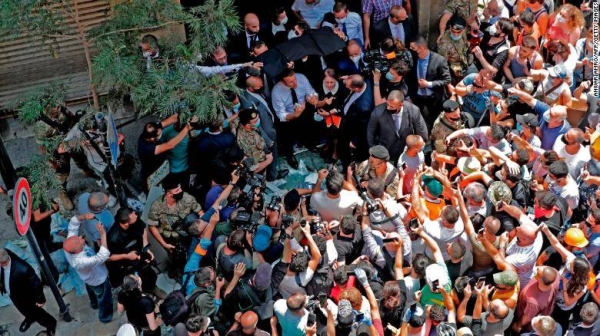 French President Emmanuel Macron speaks to the crowd in Beirut's Gemmayzeh neighborhood, which suffered extensive damage in Tuesday's massive explosion. — Courtesy photo
