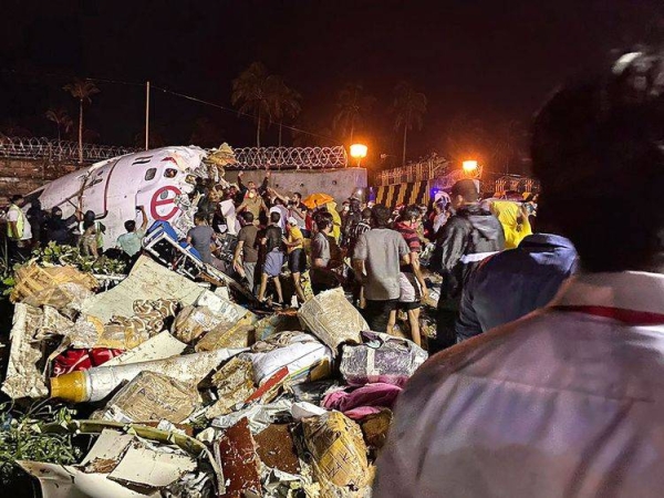 The wreckage of an Air India Express Flight IX 1344 from Dubai to Kozhikode after the plane had overshot the runway while landing around 7:40 p.m. (IST) on Friday. — Courtesy photo