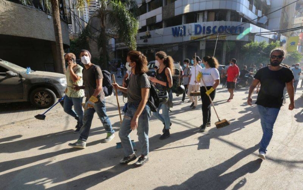 Lebanese volunteers at the devastated Gemmayzeh neighbourhood in the aftermath of a massive blast which shook the capital Beirut. — Courtesy photo