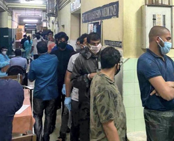 Local people engage in rescue mission at the site of the plane crash in Kozhikode.