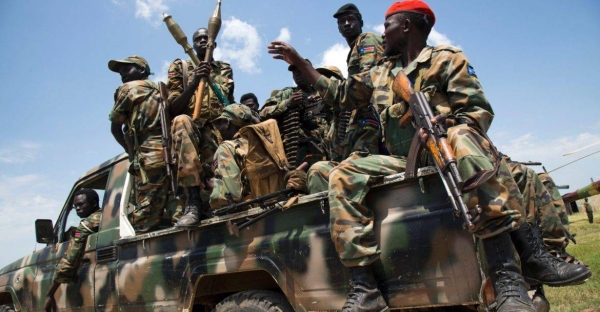 South Sudanese soldiers sit in a pick-up truck at the military base in Malakal, northern South Sudan in this file photo.
