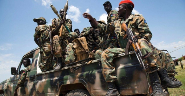 South Sudanese soldiers sit in a pick-up truck at the military base in Malakal, northern South Sudan in this file photo.
