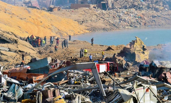 Workers in Lebanon assess the damage at Beirut Port after a deadly explosion on Aug. 4, 2020. — courtesy UNOCHA