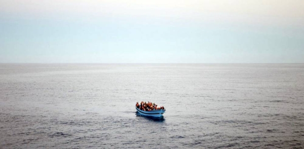 File photo shows an overloaded boat of refugees and migrants trying to reach Europe, as seen from the deck of an Italian Coastguard ship, in the Mediterranean Sea. — courtesy UNHCR/Alfredo D’Amato