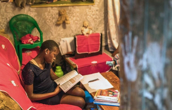 A primary school student studies at home in Kibera, Kenya. — courtesy UNICEF/Brian Otieno