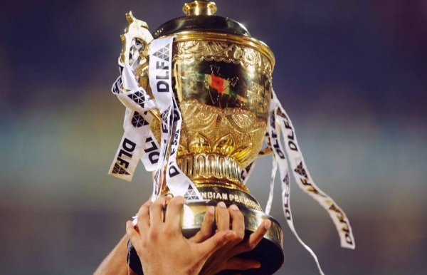 File photo of CSK players celebrating with the trophy after the IPL Twenty20 cricket final in 2011.